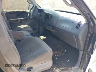 2001 Ford F-150 XL with VIN 1FTRX17L41NA08695, listed as a IAAI auction lot 42558909 with 267,203 mi miles and . Bid and sale history available at DreamBid. Image 5.