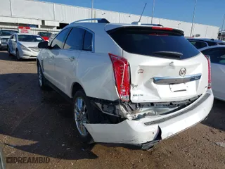 2015 Cadillac SRX Premium Collection with VIN 3GYFNDE35FS545581, listed as a IAAI auction lot 41154403 with 142,146 mi miles. Bid and sale history available at carsss.com. Image 3.