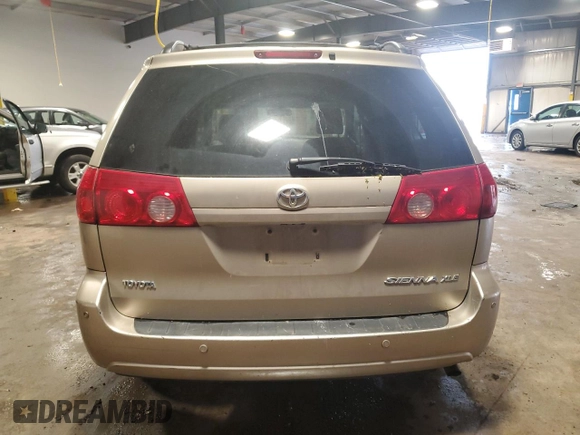2009 Toyota Sienna XLE with VIN 5TDZK22C19S228023, listed as a Copart auction lot 57072295 with 148,080 mi miles and Salvage title. Bid and sale history available at DreamBid. Image 6.
