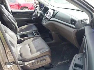 2022 Honda Odyssey EX-L with VIN 5FNRL6H77NB031502, listed as a IAAI auction lot 41706098 with 57,074 mi miles and . Bid and sale history available at DreamBid. Image 5.