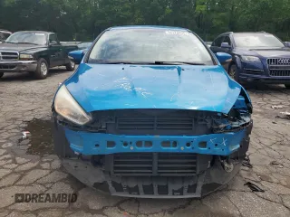 2016 Ford Focus SE z VIN 1FADP3F21GL400767, wystawiony jako Copart lot #52174835 z przebiegiem 141 264 mil mil oraz Szkoda całkowita • Salvage title. Historia ofert i sprzedaży dostępna na DreamBid. Obrazek 5.