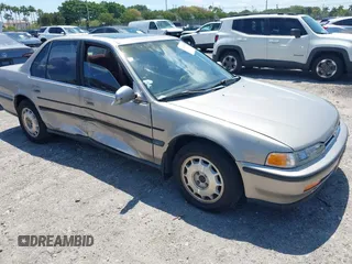 1992 Honda Accord z VIN 1HGCB7672NA124634, wystawiony jako IAAI lot #42064483 z przebiegiem 85 557 mil mil oraz . Historia ofert i sprzedaży dostępna na DreamBid. Obrazek 1.