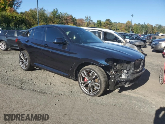 2021 BMW X4 M40i with VIN 5UX2V5C05M9H59295, listed as a Copart auction lot 71312963 with 31,050 mi miles. Bid and sale history available at carsss.com. Image 4.