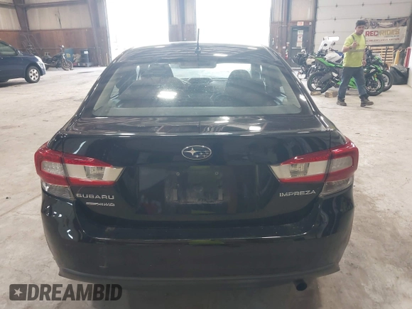 2021 Subaru Impreza with VIN 4S3GKAB64M3601075, listed as a IAAI auction lot 42530164 with 90,522 mi miles and . Bid and sale history available at DreamBid. Image 17.