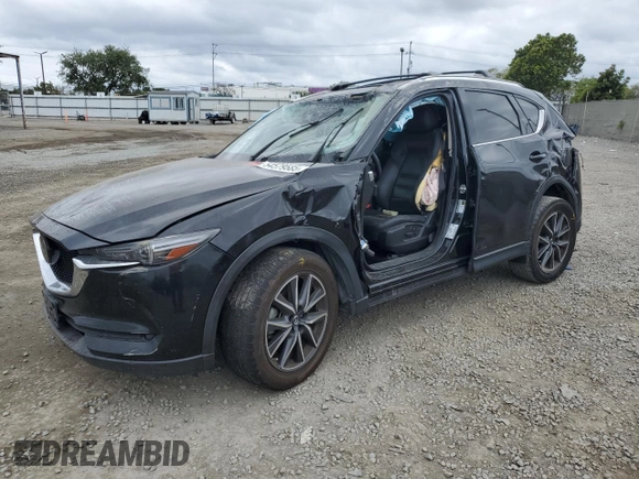 2018 Mazda CX-5 Grand Touring with VIN JM3KFADM3J1370114, listed as a Copart auction lot 54579585 with 65,513 mi miles and Salvage Title. Bid and sale history available at DreamBid. Image 1.