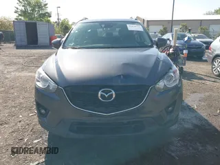 2014 Mazda CX-5 Grand Touring with VIN JM3KE4DY2E0312952, listed as a IAAI auction lot 42138721 with 99,993 mi miles and . Bid and sale history available at DreamBid. Image 12.