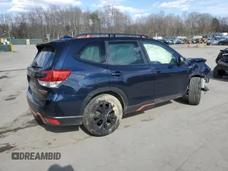 2022 Subaru Forester Sport with VIN JF2SKAJC3NH400677, listed as a Copart auction lot 50601685 with 63,918 mi miles and Salvage Title. Bid and sale history available at carsss.com. Image 3.
