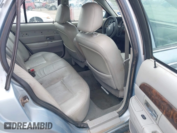 2005 Mercury Grand Marquis LS Premium z VIN 2MEFM75W75X664470, wystawiony jako IAAI lot #41960637 z przebiegiem 191 600 mil mil oraz . Historia ofert i sprzedaży dostępna na DreamBid. Obrazek 8.