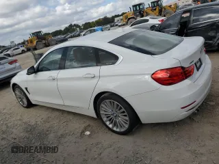 2015 BMW 4 Series 428i xDrive with VIN WBA4C9C53FG135314, listed as a Copart auction lot 82090253 with 93,188 mi miles and . Bid and sale history available at DreamBid. Image 2.