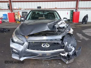 2015 Infiniti Q50 Premium z VIN JN1BV7AR3FM422042, wystawiony jako IAAI lot #42258784 z przebiegiem 72 030 mil mil oraz . Historia ofert i sprzedaży dostępna na DreamBid. Obrazek 12.