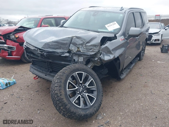 2022 Chevrolet Tahoe Z71 with VIN 1GNSKPKD4NR117277, listed as a IAAI auction lot 41547290 with 76,859 mi miles. Bid and sale history available at carsss.com. Image 6.