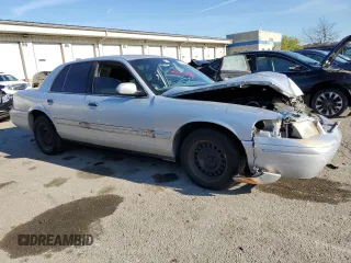 2001 Ford Crown Victoria Police Police Interceptor with VIN 2FAFP71W71X188154, listed as a Copart auction lot 79897894 with 72,916 mi miles and Salvage Title. Bid and sale history available at carsss.com. Image 4.