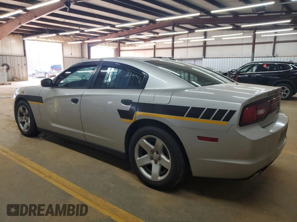 2013 Dodge Charger Police with VIN 2C3CDXAT6DH642327, listed as a Copart auction lot 50945865 with 179,229 mi miles and Salvage Title. Bid and sale history available at DreamBid. Image 2.