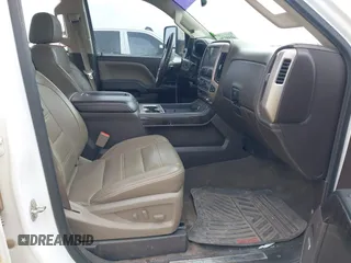 2015 GMC Sierra 2500HD available WiFi Denali with VIN 1GT120E84FF642823, listed as a IAAI auction lot 41593286 with 148,038 mi miles. Bid and sale history available at carsss.com. Image 5.