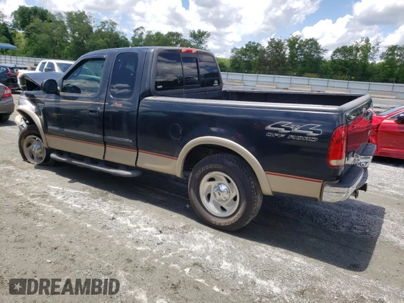 2000 Ford F-150 XL z VIN 1FTRX18L7YNB44005, wystawiony jako Copart lot #56535195 z przebiegiem 187 429 mil mil oraz Szkoda całkowita • Salvage title. Historia ofert i sprzedaży dostępna na DreamBid. Obrazek 2.