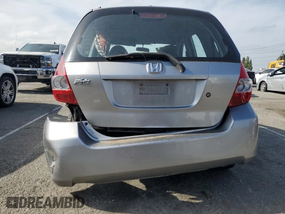 2007 Honda Fit z VIN JHMGD38447S026125, wystawiony jako Copart lot #56554145 z przebiegiem 227 284 mil mil oraz Szkoda całkowita • Salvage title. Historia ofert i sprzedaży dostępna na DreamBid. Obrazek 6.