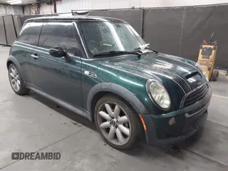 2006 MINI Hardtop S with VIN WMWRE33536TJ40341, listed as a IAAI auction lot 42637418 with 93,338 mi miles and . Bid and sale history available at DreamBid. Image 1.