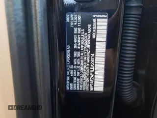 2020 Porsche Cayenne E-Hybrid Hybrid z VIN WP1AE2AY1LDA23014, wystawiony jako Copart lot #69147512 z przebiegiem 52 259 mil mil oraz . Historia ofert i sprzedaży dostępna na DreamBid. Obrazek 13.