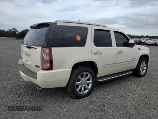 2012 GMC Yukon Denali with VIN 1GKS1EEF2CR293128, listed as a Copart auction lot 74567484 with 0 mi miles and Salvage Title. Bid and sale history available at carsss.com. Image 3.