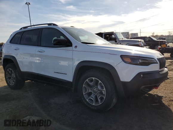 2022 Jeep Cherokee Trailhawk with VIN 1C4PJMBX3ND505107, listed as a Copart auction lot 77418384 with 12,952 mi miles and Clean Title. Bid and sale history available at carsss.com. Image 4.