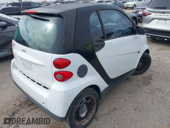 2010 Smart fortwo Pure with VIN WMEEJ3BA5AK390904, listed as a IAAI auction lot 41688922 with Not provided miles and . Bid and sale history available at DreamBid. Image 4.