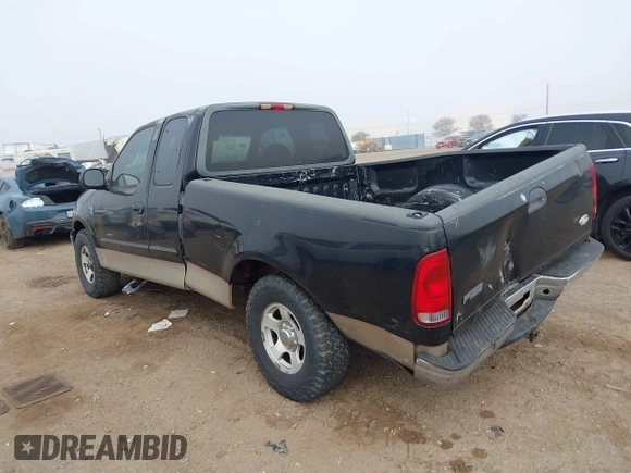 2000 Ford F-150 XL with VIN 1FTRX17L4YKB03771, listed as a IAAI auction lot 41668491 with 1 mi miles. Bid and sale history available at carsss.com. Image 14.