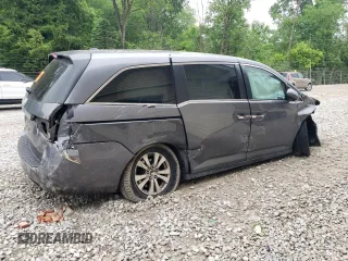 2014 Honda Odyssey EX-L with VIN 5FNRL5H69EB125480, listed as a Copart auction lot 59988475 with Not provided miles and Salvage title. Bid and sale history available at DreamBid. Image 3.