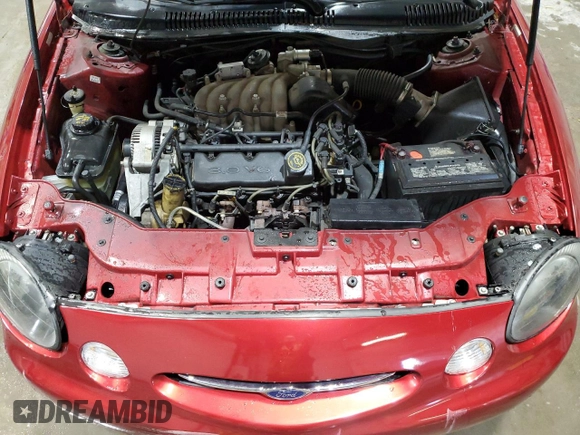 1999 Ford Taurus SE z VIN 1FAFP53U2XA272724, wystawiony jako Copart lot #42030425 z przebiegiem 89 712 mil mil oraz Szkoda całkowita • Salvage title. Historia ofert i sprzedaży dostępna na DreamBid. Obrazek 11.