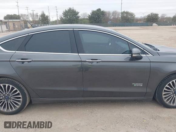2017 Ford Fusion Titanium with VIN 3FA6P0SU8HR104727, listed as a IAAI auction lot 41242482 with 83,021 mi miles and . Bid and sale history available at DreamBid. Image 14.