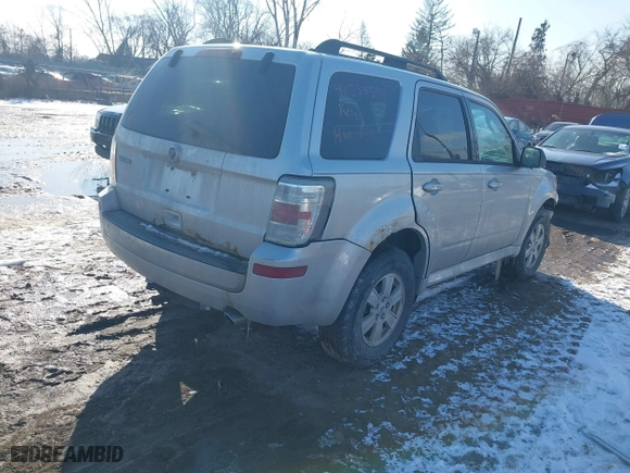 2010 Mercury Mariner with VIN 4M2CN8B72AKJ30465, listed as a IAAI auction lot 41554592 with 110,973 mi miles. Bid and sale history available at carsss.com. Image 4.