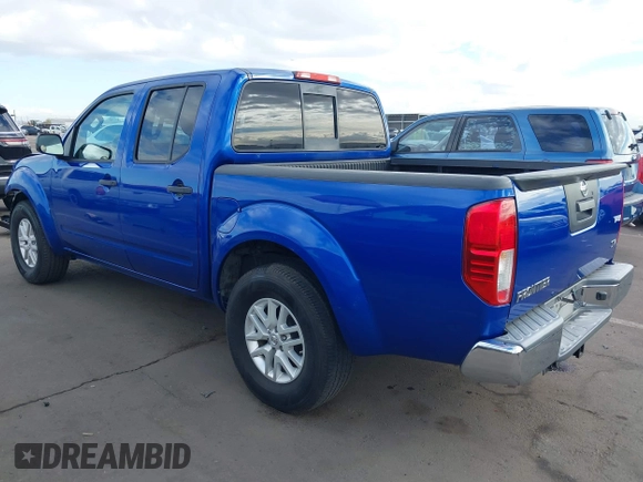2014 Nissan Frontier SV with VIN 1N6AD0ER1EN765693, listed as a IAAI auction lot 41560914 with 165,572 mi miles and . Bid and sale history available at DreamBid. Image 3.