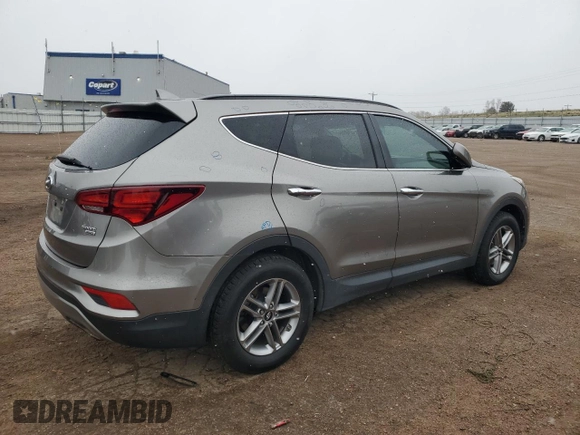 2017 Hyundai Santa Fe 2.4L z VIN 5NMZUDLB7HH030253, wystawiony jako Copart lot #51302445 z przebiegiem 136 074 mil mil oraz Szkoda całkowita • Salvage title. Historia ofert i sprzedaży dostępna na DreamBid. Obrazek 3.