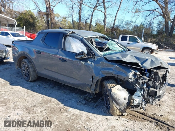 2022 Hyundai Santa Cruz SEL with VIN 5NTJB4AE7NH014148, listed as a IAAI auction lot 41263713 with 70,619 mi miles and . Bid and sale history available at DreamBid. Image 1.