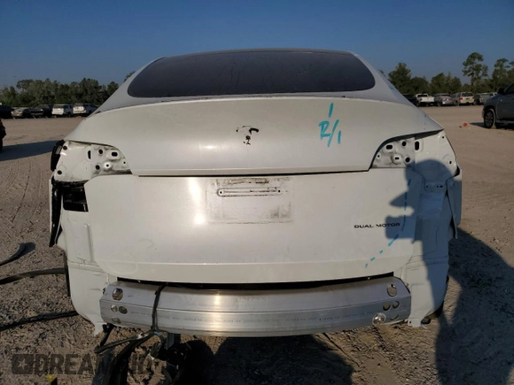 2023 Tesla Model Y Long Range z VIN 7SAYGDEE8PA069248, wystawiony jako Copart lot #74120944 z przebiegiem 17 085 mil mil oraz Szkoda całkowita • Salvage title. Historia ofert i sprzedaży dostępna na DreamBid. Obrazek 6.