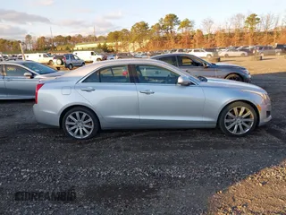2013 Cadillac ATS Luxury with VIN 1G6AH5S37D0126611, listed as a IAAI auction lot 40982726 with 127,572 mi miles. Bid and sale history available at carsss.com. Image 13.