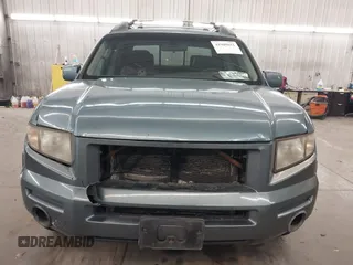 2006 Honda Ridgeline RTL with VIN 2HJYK16556H508101, listed as a IAAI auction lot 41909651 with 301,945 mi miles. Bid and sale history available at carsss.com. Image 6.