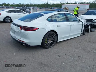 2018 Porsche Panamera 4 E-Hybrid with VIN WP0AE2A74JL130540, listed as a IAAI auction lot 42078444 with 65,981 mi miles and . Bid and sale history available at DreamBid. Image 4.