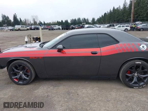 2014 Dodge Challenger R/T Plus z VIN 2C3CDYBT1EH177266, wystawiony jako IAAI lot #41798977 z przebiegiem 109 489 mil mil oraz . Historia ofert i sprzedaży dostępna na DreamBid. Obrazek 15.