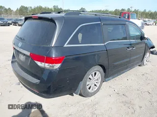 2015 Honda Odyssey EX-L with VIN 5FNRL5H65FB088106, listed as a IAAI auction lot 41880915 with 176,539 mi miles and . Bid and sale history available at carsss.com. Image 4.