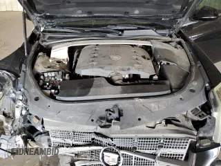 2011 Cadillac CTS Luxury z VIN 1G6DE5EYXB0151366, wystawiony jako Copart lot #59153235 z przebiegiem 117 837 mil mil oraz Szkoda całkowita • Salvage title. Historia ofert i sprzedaży dostępna na DreamBid. Obrazek 11.