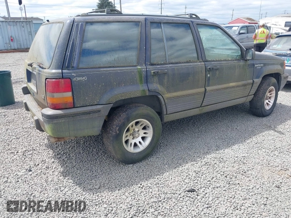1994 Jeep Grand Cherokee Laredo z VIN 1J4GZ58Y2RC320793, wystawiony jako IAAI lot #42781115 z przebiegiem 275 518 mil mil oraz . Historia ofert i sprzedaży dostępna na DreamBid. Obrazek 4.