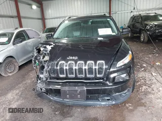 2014 Jeep Cherokee Latitude with VIN 1C4PJLCS2EW116959, listed as a IAAI auction lot 41926058 with 69,280 mi miles. Bid and sale history available at carsss.com. Image 12.
