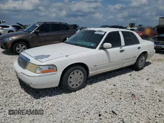 2005 Mercury Grand Marquis GS z VIN 2MEFM74W05X620893, wystawiony jako Copart lot #55088955 z przebiegiem 115 670 mil mil oraz Szkody całkowita. Historia ofert i sprzedaży dostępna na DreamBid. Obrazek 1.