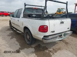 2002 Ford F-150 XLT with VIN 1FTRW07602KB74836, listed as a IAAI auction lot 42069307 with 295,692 mi miles. Bid and sale history available at carsss.com. Image 3.