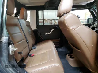 2012 Jeep Wrangler Unlimited Rubicon with VIN 1C4HJWFG4CL119390, listed as a Copart auction lot 60026425 with 305,189 mi miles and Salvage title. Bid and sale history available at DreamBid. Image 11.