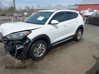 2017 Hyundai Tucson SE with VIN KM8J3CA44HU437644, listed as a IAAI auction lot 41825957 with 59,402 mi miles. Bid and sale history available at carsss.com. Image 18.