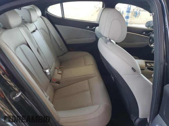 2023 Genesis G70 2.0T z VIN KMTG34TA1PU132593, wystawiony jako Copart lot #49231195 z przebiegiem 36 246 mil mil oraz Szkody całkowita. Historia ofert i sprzedaży dostępna na DreamBid. Obrazek 10.