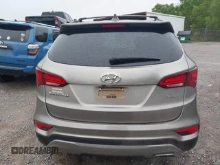 2017 Hyundai Santa Fe 2.4L z VIN 5XYZU3LB8HG421397, wystawiony jako IAAI lot #41961915 z przebiegiem 102 594 mil mil oraz . Historia ofert i sprzedaży dostępna na DreamBid. Obrazek 16.