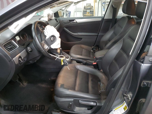 2013 Volkswagen Jetta SE with VIN 3VWDX7AJ2DM309725, listed as a Copart auction lot 86052114 with 70,828 mi miles and Salvage title. Bid and sale history available at DreamBid. Image 7.