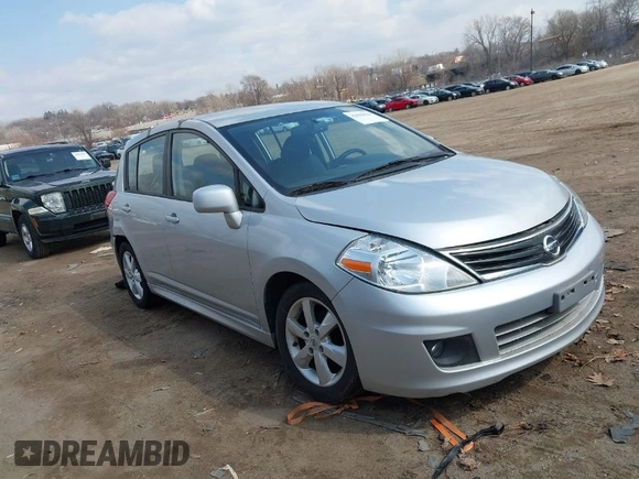2012 Nissan Versa S with VIN 3N1BC1CP2CK272290, listed as a IAAI auction lot 42030626 with 136,000 mi miles. Bid and sale history available at carsss.com. Image 1.